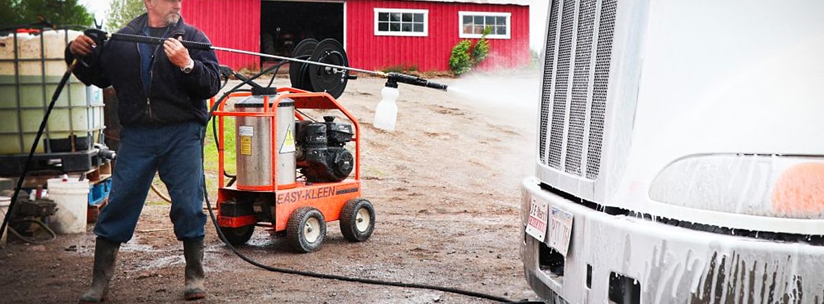 Farmer Using Hot Water Professional Power Washer