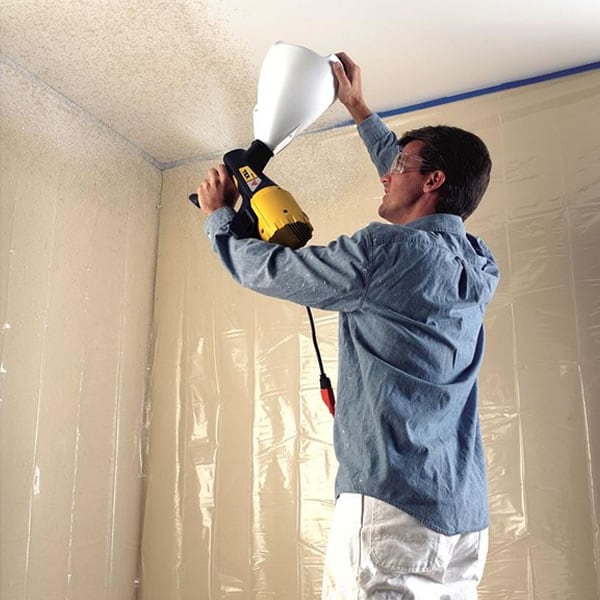 Man Using HVLP Paint Sprayer on Ceiling