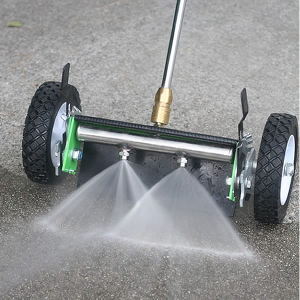 Water Broom Being Used on Driveway